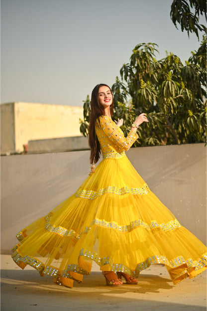 Mustered Yellow Ruffle Net Embroidery Work Gown For Girls